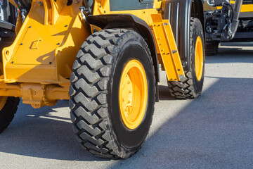 closeup of a wheel of earth moving machine