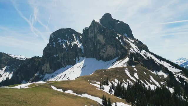 Aerial view over a mountain peak in the Alps - aerial drone photography
