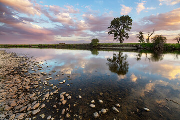 Naklejka premium Lake on sunset
