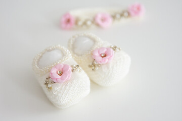 Fototapeta na wymiar Baby girl shoes crochet