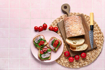 Composition with delicious radish bruschettas on pink tiled table
