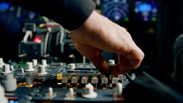 The captain presses the buttons on the control panel to start the engine of the plane flight Up close flight simulator