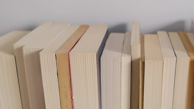 walk past your books with a slider motion in slow motion