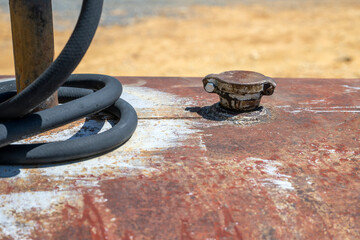 An old fuel steel tank cap