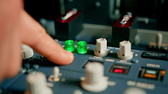The captain presses the buttons on the control panel to start the engine of the plane flight Up close flight simulator