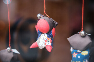 Sarubobo doll, Japanese amulet, in the town of Takayama in Gifu, Japan.