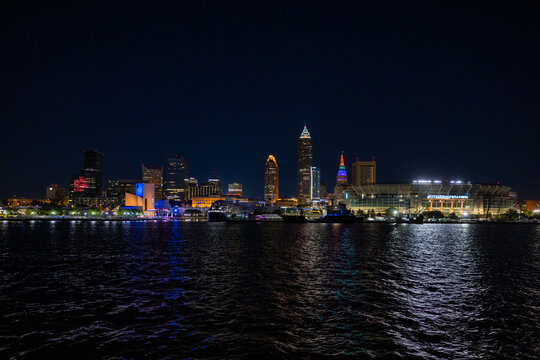 Cleveland Downtown from Lake Erie during night with illuminated skyline. 