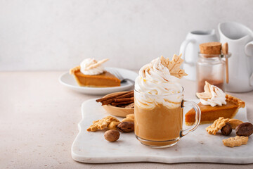 Pumpkin pie latte with whipped cream and cinnamon