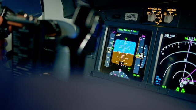 A detailed shot of the radar control and navigation panel in the cockpit of the flight simulator data on the on-board computer