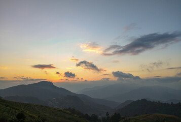 morning mountain scenery foggy and golden skies