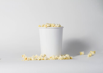 Blank white popcorn bucket mockup isolated, 3d rendering. Clear pop corn pail mockup fastfood front side view. Paper snack bucketful design mock up. 3D illustration.