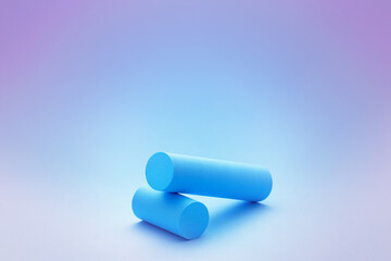 Two blue cylinders lying on blue and pink background. Template composition for advertising display, presentation of products.