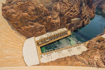 Looking down the wall into the water and generating facility of the hoover dam, United States. 