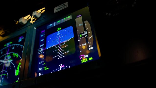 A detailed shot of the radar control and navigation panel in the cockpit of the flight simulator data on the on-board computer