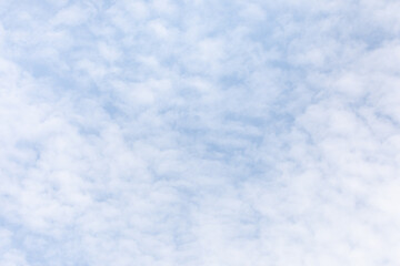 Fototapeta na wymiar Blue sky covered with white clouds.