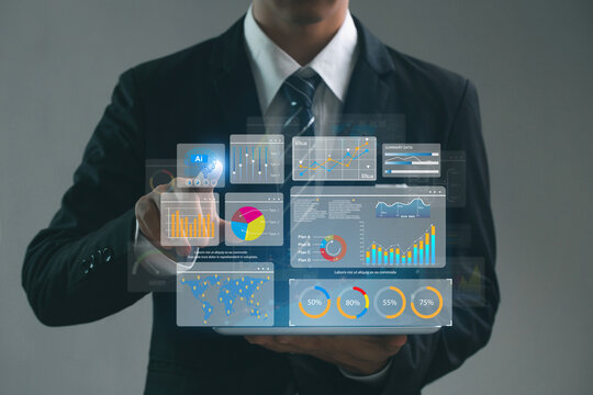 Businessman working with artificial intelligence AI and key performance indicators (KPI) dashboard for data business analysis and Data Management Systems (DMS)  and marketing analysis.Data analysis.
