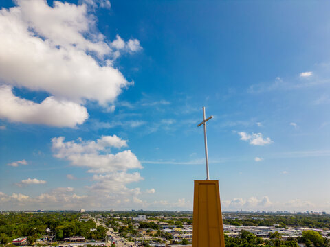 Photo of a cross on blue sky