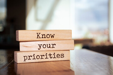 Wooden blocks with words 'Know your priorities'.