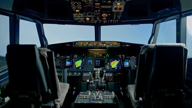 Empty airplane cockpit or flight deck modern passenger plane ready to fly flight simulator