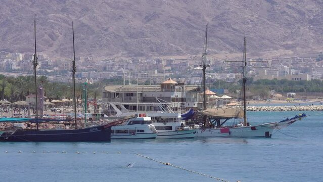 Marina With Docked Yachts And Fishing Boats In Eilat, Israel - wide