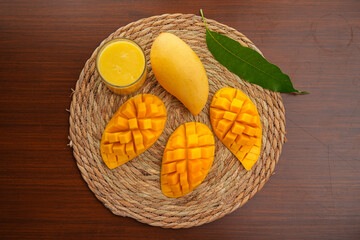 Ripe mango on wood,Ripe Mango Slice on wooden cutting board