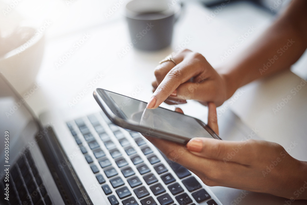 Aufkleber Woman, hands and phone at a laptop for work networking and employee typing. Female worker, table and social network app with mobile communication and text for professional and web connection