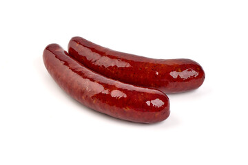 Grilled german bratwurst sausages, isolated on white background.