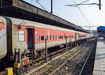 Fototapeta na wymiar Indian railway train at Amritsar railway station platform during morning time, Colourful train at Amritsar, Punjab railway station