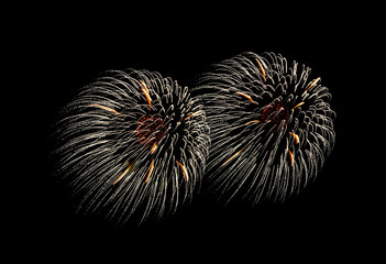 Yellow firework sparkling on black background for celebration and anniversary .