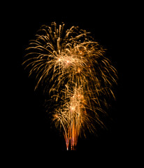 Golden firework sparkling on black background for celebration and anniversary