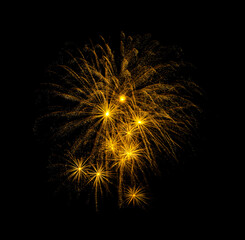 Golden firework sparkling on black background for celebration and anniversary - 600319485
