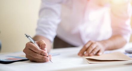 Business man working with laptop and documents