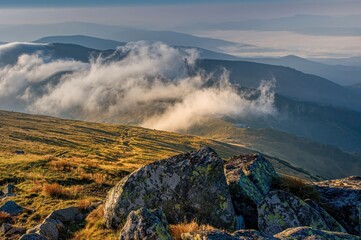 Mountain Landscape in Colourful Sunsrise. View from Mount Dumbier in Low Tatras, Slovakia. Wonderful atmosphere of the morning in the mountains.