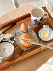 Muchroom soup, bread and coffee  for breakfast. Morning time. Bakery. Toast. Fresh meal. Scandinavian style. Simply food. Homemade sandwich. Food tray. Simplicity. Lifestyle living. Breakfast tray.