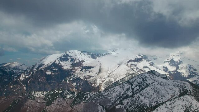 Breathtaking stormy clouds over the mountain peaks in Maiella National Park in Abruzzo, Italy shot with a 4K drone