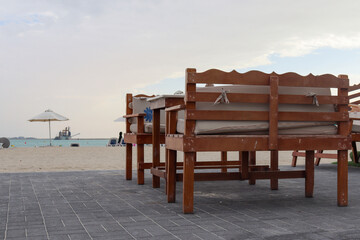 table and chairs on the beach