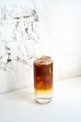 Espresso tonic cocktail. The Espresso and Tonic is a cold coffee drink that feels indulgent