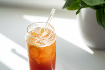 Close up of cold orange lemonade with ice
