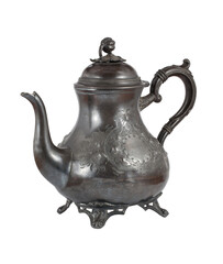 Metal tea pot with decorative floral motif standing on legs. Decorative handles and legs. Item, old, antique. On a transparent background.