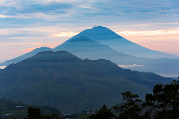 Mountain landscape on Bali, Indonesia. Volcanos Batur and Agung on sunrise