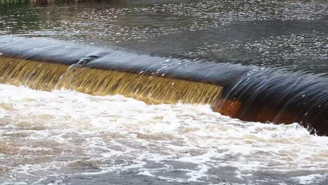 River Ribble stained with peat, Lancashire