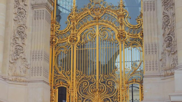 Golden Wrought-iron Entrance Gate Of Petit Palais, An Art Museum In Paris, France. closeup