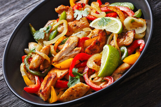 chicken fajitas with bell peppers, onion, spices
