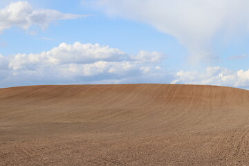 Farmland and sky. April