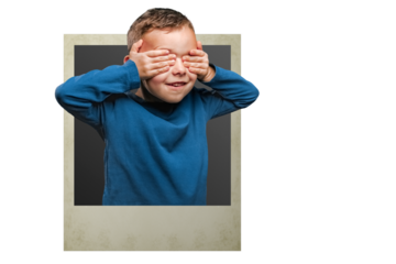 the child looks out of the Polaroid card