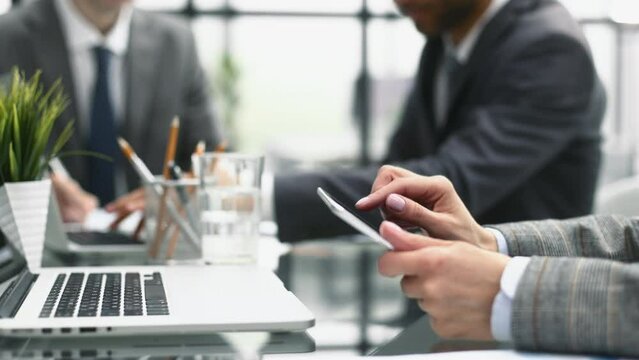 Business adviser analyzing financial figures denoting the progress in the work of the company.