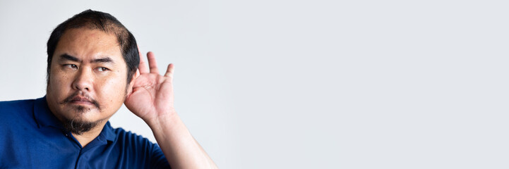 Obraz premium unhappy middle aged old man listening to bad news with negative expression