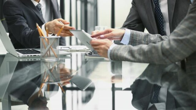 Business adviser analyzing financial figures denoting the progress in the work of the company