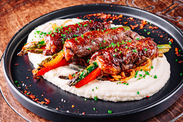 beef rolls stuffed with sweet pepper and asparagus