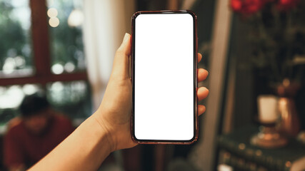 Women's hands holding cell telephone blank copy space screen. smartphone with blank white screen isolated on white background . smart phone with technology concept